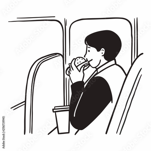 Young man eating burger and drinking coffee while riding bus  