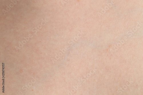 Foto Texture of normal skin as background, closeup
