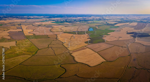 Sussex Wind Turbines at Fiery Sunset Across Rural England Countryside View