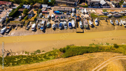 Konstfotografi Boats at Low Tide Aerial View in Sussex Estuary and Riverside Boatyard