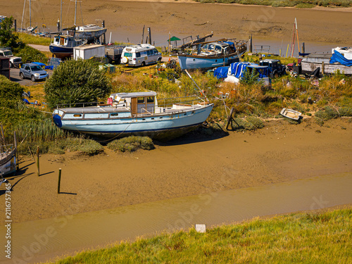 Konstfotografi Boats at Low Tide Aerial View in Sussex Estuary and Riverside Boatyard