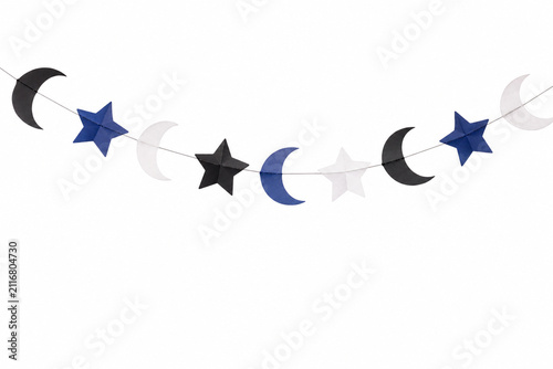 A paper garland of linked cut-out crescent moons and stars hanging in a shallow curve, photographed from a low angle looking. Generative AI photorealistic Halloween studio image isolated on white.
