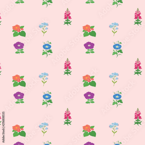 Charming seamless floral pattern with vibrant blooming spring and summer flowers on a soft pink background