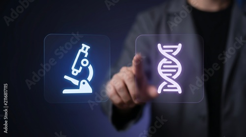 Business professional interacting with glowing digital icons of microscope and dna helix representing biotechnology and scientific research