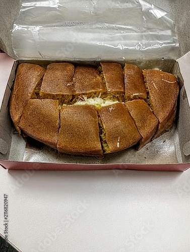 Quadro su tela Delicious Indonesian martabak manis with cheese and chocolate filling, perfect s