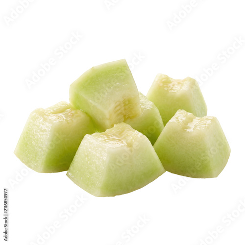 Fresh diced honeydew melon cubes isolated on white background