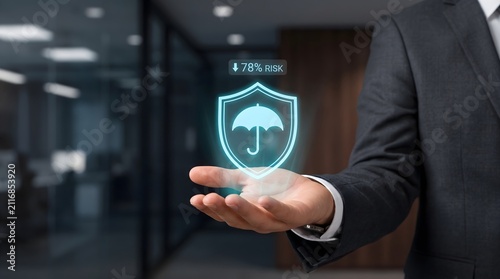 Insurance shield icon shows a 78% risk reduction above a businessman's hand
