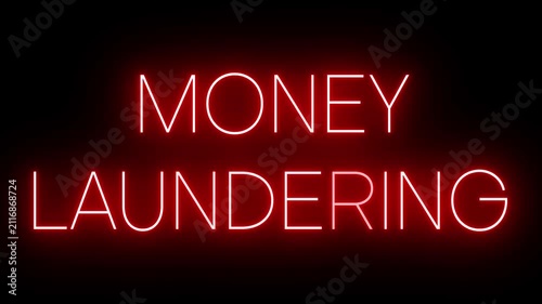Red Neon MONEY LAUNDERING Sign Flickering on Black Background