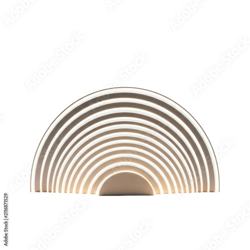 Modern LED rainbow table lamp. Minimalist arc light fixture isolated on white background.