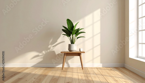 A sunlit, minimalist interior features a leafy green plant on a small wooden table against a pale wall, near a bright window