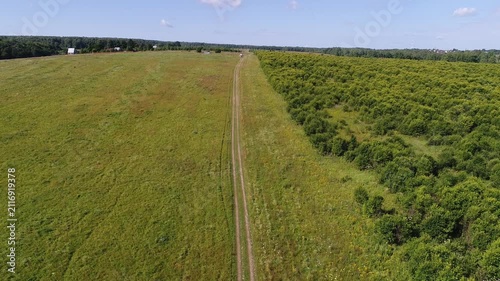 Smooth descent over meadow and bushes