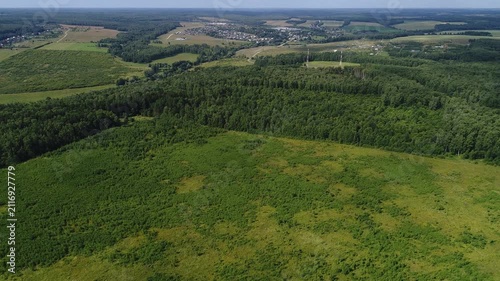 Elevated rise over rural forested landscape