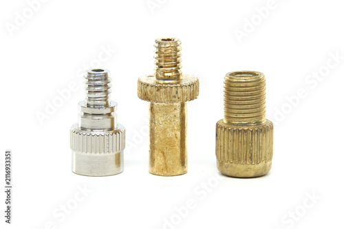 фотографія Set of three bicycle valve adapters for inflating tires with different pump type