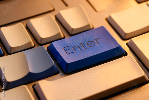 Blue enter key on a compute...