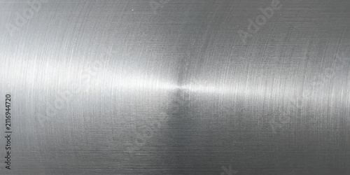 Brushed stainless steel texture with a sleek metallic finish and modern industrial style.