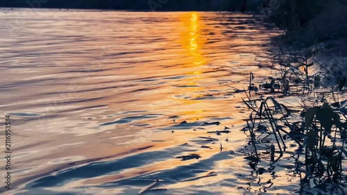Sunset River Water Golden Reflection Calm Waves On Natural Shore,video