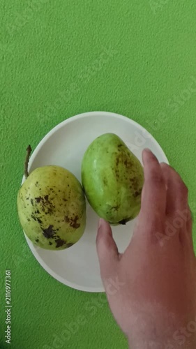 Delicious Ripe Mango Video Footage Featuring Fresh Tropical Fruit with Juicy Golden Flesh Ready to Eat in Natural Light