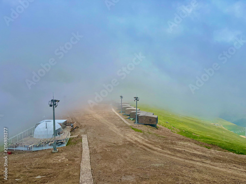 Foggy mountain landscape at Shymbulak Resort in the Trans-Ili Alatau Mountains, Kazakhstan