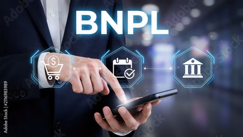 Businessman using mobile phone for buy now pay later service with digital icons