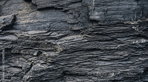 Close-up of textured dark wood surface. Natural rustic background for design projects.