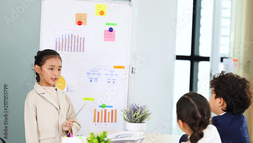 Canvastavla Young Asian Girl in Blazer Giving Business Presentation to Child Colleagues