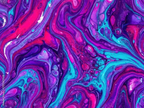 Vibrant acrylic pour painting with swirling pink purple and turquoise fluid patterns abstract background