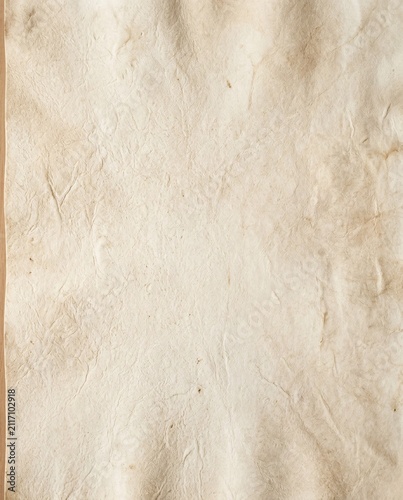 Aged Parchment Texture with Creases and Discoloration, Ideal for Retro and Grunge Backgrounds