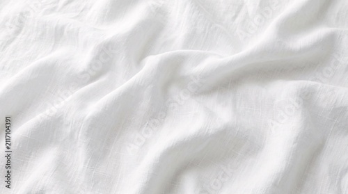 Elegant white linen or cotton fabric background with gentle folds and a delicate woven texture, ideal for clean and fresh designs