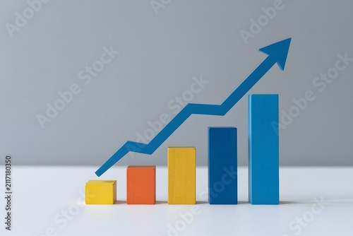 Economic recovery concept with upward financial graph and rising arrow