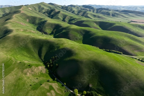 Rolling hills green countryside aerial view