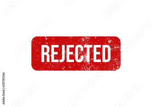 A red grunge rubber stamp with the word rejected isolated on a white background for business documents