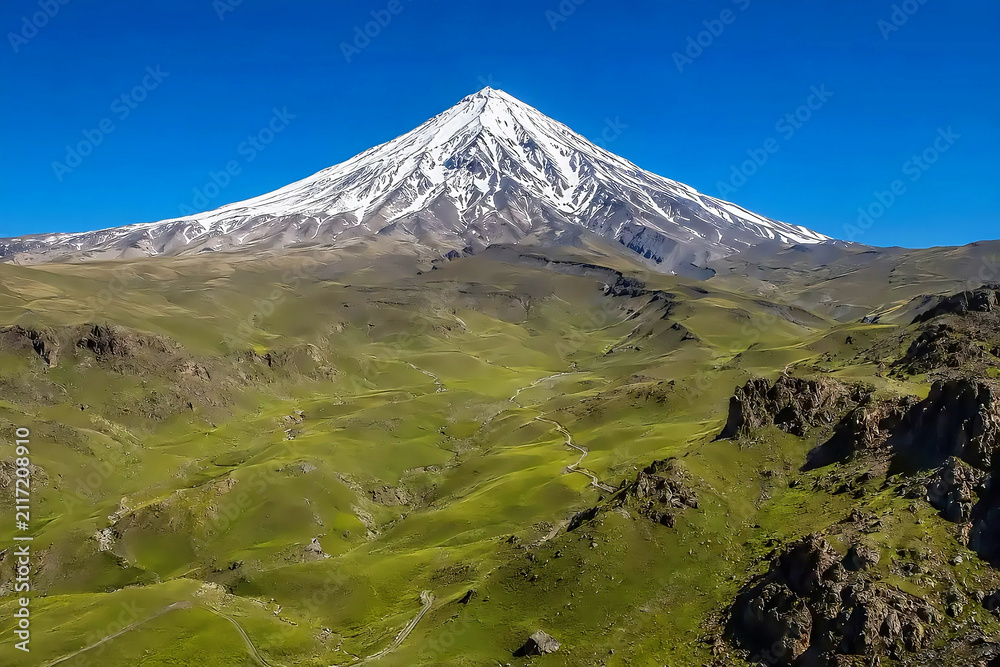 Fototapeta premium Snow Capped Mount Damavand Volcano Above Green Valley Alborz Mountains Iran