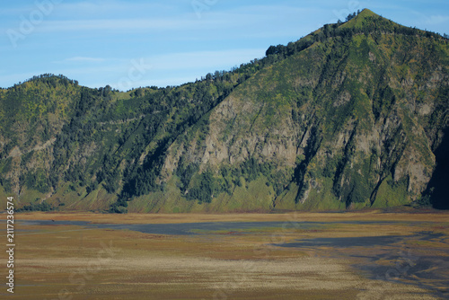 Bromo Tengger Semeru National Park. Java, Indonesia. The Tengger massif within the park is an active volcanic complex surrounded by a plain of sand.