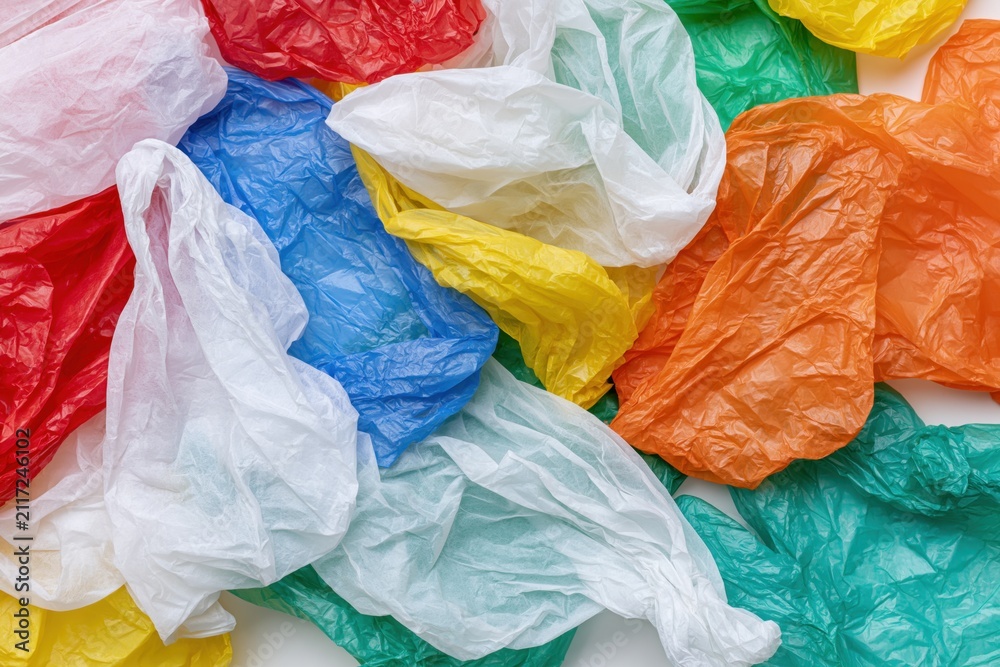 Obraz premium The Colorful Crumpled Plastic Bags Creating Abstract Texture and Waste Art