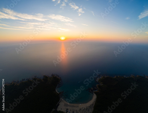 Drone Flying Forward Over Silistar Beach Bay at Golden Sunrise Sunset