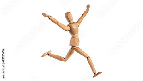 Fotografie Artistic wooden human mannequin figure running active pose isolated on transpare