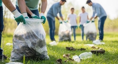 Family members picking up litter in park on sunny day  