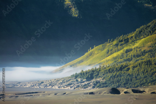Misty morning covered over valley of Mount Bromo Tengger Semeru National Park.