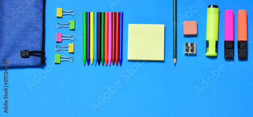 Zenith view. Back to school concept, blue background and copy space.