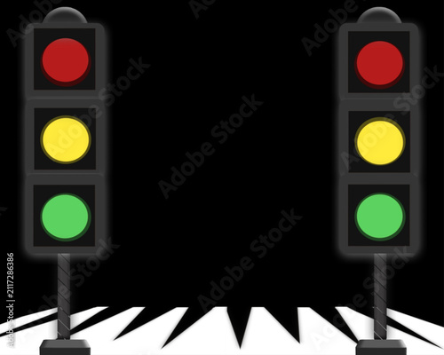 фотографія Two vertical traffic light signals on a dark background with transportation junc