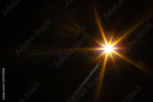 Sun flare on the black background