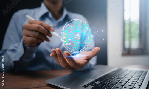 AI compute memory energy concept man holding circular hologram showing GPU processor RAM and battery integrated circuit ecosystem artificial intelligence