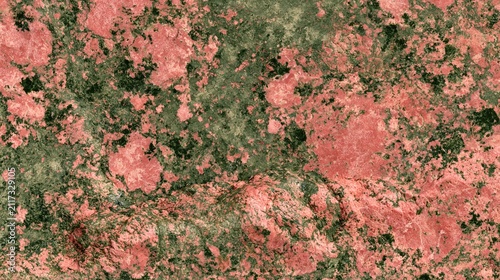 Close-up flat lay of unakite epidote stone texture, distinctive mottled combination of salmon pink and moss green tones, studio flat lighting, ultra high resolution stone background 