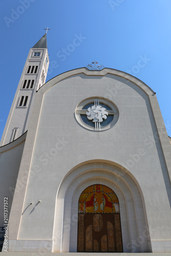 Saint Peter and Paul Church with Bell Tower and Blue Sky Background in Mostar, Bosnia and Herzegovina