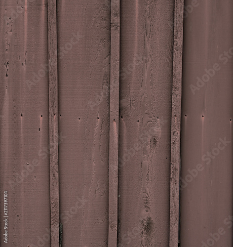 Canvastavla Vertical close up view of a brown painted board and batten wood siding surface w