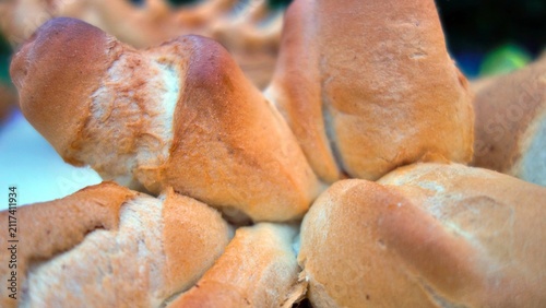 Close-up of freshly baked bread rolls with a golden-brown crust