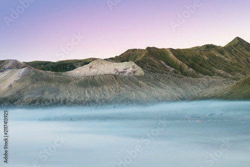 Misty morning covered over valley of Mount Bromo Tengger Semeru National Park.