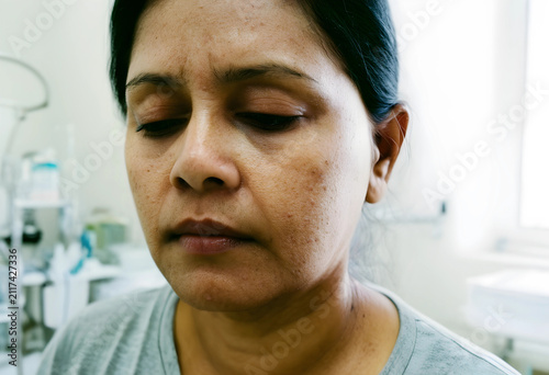 Close up of a womans face w...