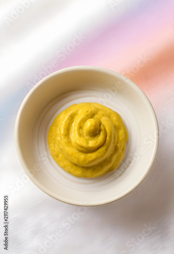 Swirl of yellow mustard in ...