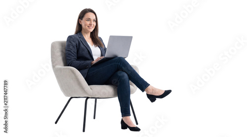Successful Businesswoman Sitting in Modern Chair Working on Laptop Isolated